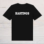 Hastings T-Shirt - black with white text, on front or back, ideal holidays, jokes, tours, gifts, trend setters will wear this! - Rainbowprint.uk