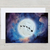 Space card with Santa and his Reindeers going past the moon